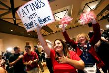 Attendees at a Republican Party event in Phoenix watch as President-elect Donald Trump gives his acceptance speech in New York in the early morning hours of Nov. 9, 2016. (CNS/Reuters/Nancy Wiechec)