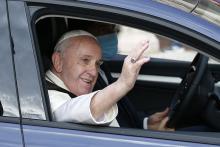 Pope Francis waves from his car after celebrating Mass and signing his new encyclical, "Fratelli Tutti, on Fraternity and Social Friendship" at the Basilica of St. Francis Oct. 3 in Assisi, Italy. (CNS/Paul Haring)