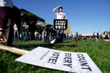 A woman holds a sign during a rally demanding a fair count of the votes of the presidential election in Philadelphia Nov. 4. (CNS/Reuters/Eduardo Munoz)