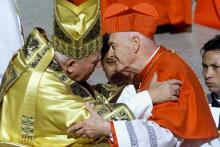 New U.S. Cardinal Theodore McCarrick kisses Pope John Paul II after he received the red biretta during a consistory ceremony in St. Peter's Square at the Vatican Feb. 21, 2001. (CNS/Vincenzo Pinto, Reuters)