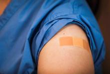 A Band-Aid is seen on the arm of a COVID-19 vaccinated person at Boston Medical Center Dec. 16, 2020. (CNS/Erin Clark, Pool via Reuters)