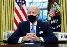 President Joe Biden at the White House in Washington Jan. 20, after his inauguration as the 46th president of the United States. At right (CNS/Reuters/Tom Brenner)