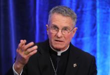 Archbishop Timothy Broglio of the U.S. Archdiocese for the Military Services, gestures during a Nov. 15 news conference after being elected president of the U.S. Conference of Catholic Bishops during the fall general assembly of the bishops in Baltimore. (CNS/Bob Roller)