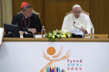 Pope Francis speaks as Maltese Cardinal Mario Grech, secretary-general of the Synod of Bishops, looks on during a meeting with representatives of bishops' conferences from around the world at the Vatican in this Oct. 9, 2021. (CNS photo/Paul Haring)