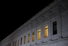 Lights burn inside U.S. Supreme Court offices May 2 in Washington, after the leak of a draft majority opinion written by Justice Samuel Alito preparing for a majority of the court to overturn the Roe v. Wade abortion rights decision later this year. (CNS)