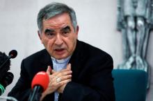 Cardinal Angelo Becciu speaks with journalists during a news conference in Rome in this Sept. 25, 2020, file photo. (CNS photo/Guglielmo Mangiapane, Reuters)