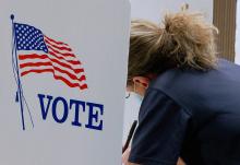 A voter marks a ballot during the primary election and abortion referendum at a Wyandotte County polling station Aug. 2 in Kansas City, Kansas. (CNS/Reuters/Eric Cox)