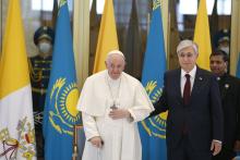 Pope Francis is welcomed by Kazakh President Kassym-Jomart Tokayev as he arrives at the international airport in Nur-Sultan, Kazakhstan, Sept. 13, 2022. (CNS photo/Paul Haring)