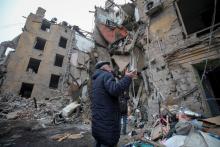 A local resident gestures outside a residential building in Kramatorsk, Ukraine, Feb. 2, 2022, which was destroyed by a Russian missile strike. (OSV News/Reuters/Vyacheslav Madiyevskyy)