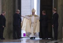 Pope Francis opens the Holy Door of St. Peter's Basilica to inaugurate the Jubilee Year of Mercy at the Vatican in this Dec. 8, 2015, file photo. (CNS/Vatican Media)