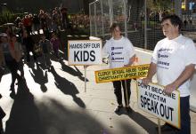 Australians protest clergy sexual abuse outside St. Mary's Cathedral in Sydney during Pope Benedict XVI's visit to celebrate World Youth Day in 2008. He met with the victims of abuse in Australia and in the U.S. that year. (CNS photo/Paul Haring)