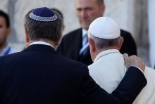 Rabbi Abraham Skorka and Pope Francis embrace after visiting the Western Wall in Jerusalem May 26, 2014. They have been friends for 25 years and co-authored "On Heaven and Earth" in 2010. (CNS photo/Paul Haring)