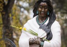 Detail view of the statue of St. Kateri Tekakwitha outside the Cathedral Basilica of St. Francis of Assisi in Santa Fe. This depiction of the Algonquin-Mohawk maiden by Jemez sculptor Estella Loretto has features and ornamentation representative of the Pueblo people. (CNS/Nancy Wiechec)