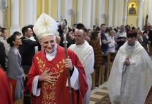 Cardinal Matteo Zuppi greets parishioners after celebrating Mass at the Cathedral of the Immaculate Conception in Moscow June 29. Zuppi's June 28-29 Moscow visit marked the second round of a mission to bring peace to Ukraine. (AP/Alexander Zemlianichenko)