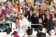 Pope Francis, accompanied by Cardinal Manuel Clemente of Lisbon, Portugal, arrives at Tejo Park in Lisbon for the closing World Youth Day Mass Aug. 6, 2023. (CNS photo/Lola Gomez)