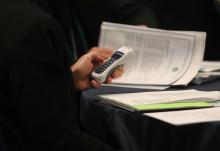 A bishop uses an electronic voting device during a Nov. 14, 2023, session of the fall general assembly of the U.S. Conference of Catholic Bishops in Baltimore. (OSV News/Bob Roller)