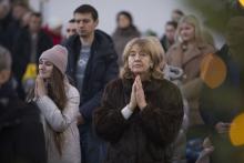 Worshippers pray the blessing of water on the Dnipro River after Major Archbishop Sviatoslav Shevchuk, head of the Ukrainian Greek Catholic Church, celebrated a Divine Liturgy Jan. 6, 2024, at the Patriarchal Cathedral of the Resurrection of Christ in Kyiv amid ongoing Russian aggression in Ukraine. (OSV News/Courtesy of Ukrainian Greek Catholic Church)