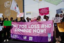 Climate activists, including religious leaders, demonstrate at the COP27 U.N. climate summit on Nov. 11, 2022, in Sharm el-Sheikh, Egypt, calling for increased funding for climate action. (NCR photo/Doreen Ajiambo)