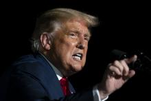 President Donald Trump speaks during a campaign rally at Orlando Sanford International Airport Oct. 12 in Sanford, Florida. (AP Photo/Evan Vucci)