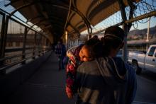 A Honduran immigrant near El Paso, Texas, walks back to Ciudad Juárez, Mexico, April 20, after U.S. Customs and Border Protection changed his family's dates for immigration court during the coronavirus pandemic. (CNS/Reuters/Paul Ratje)