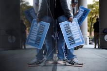 People in Houston gather to protest outside of a federal courthouse Nov. 2, where a judge rejected a GOP bid to throw out ballots cast at drive-through polling locations. (CNS/Reuters/Callaghan O'Hare)