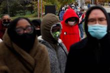 People in Cleveland wait in line to cast early in-person votes Oct. 24. (CNS/Reuters/Shannon Stapleton)