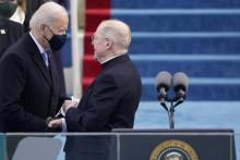 Joe Biden greets Jesuit Fr. Leo O'Donovan during Biden's inauguration as the 46th president of the United States at the U.S. Capitol in Washington Jan. 20, 2021. (CNS/Reuters pool/Patrick Semansky)