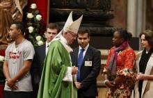 Pope Francis walks to his seat after greeting synod observers during the closing Mass of the Synod of Bishops on young people, the faith and vocational discernment in St. Peter's Basilica at the Vatican Oct. 28, 2018. (CNS/Paul Haring)