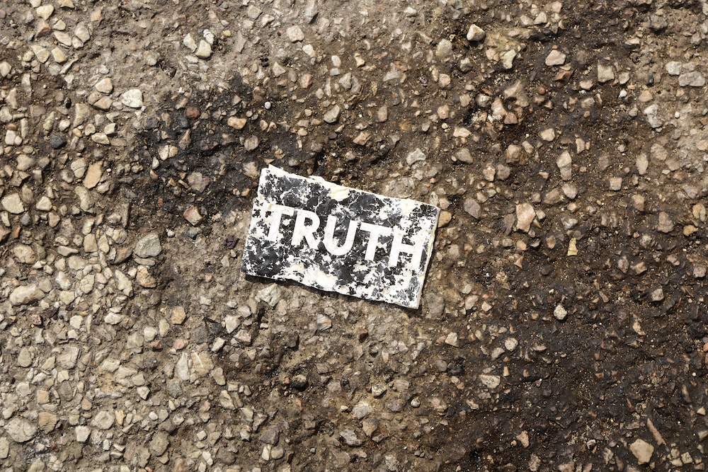 card with word "truth" on it on the ground card with word "truth" on it on the ground