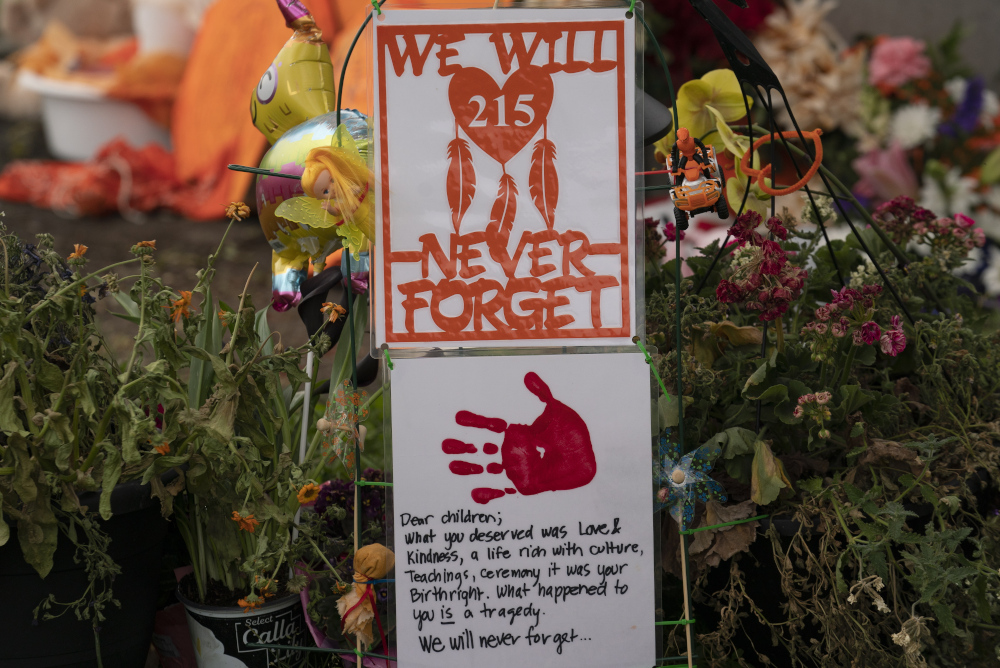 A memorial is seen outside the Residential School on June 13 in Kamloops, British Columbia. (AP/The Canadian Press/Jonathan Hayward)