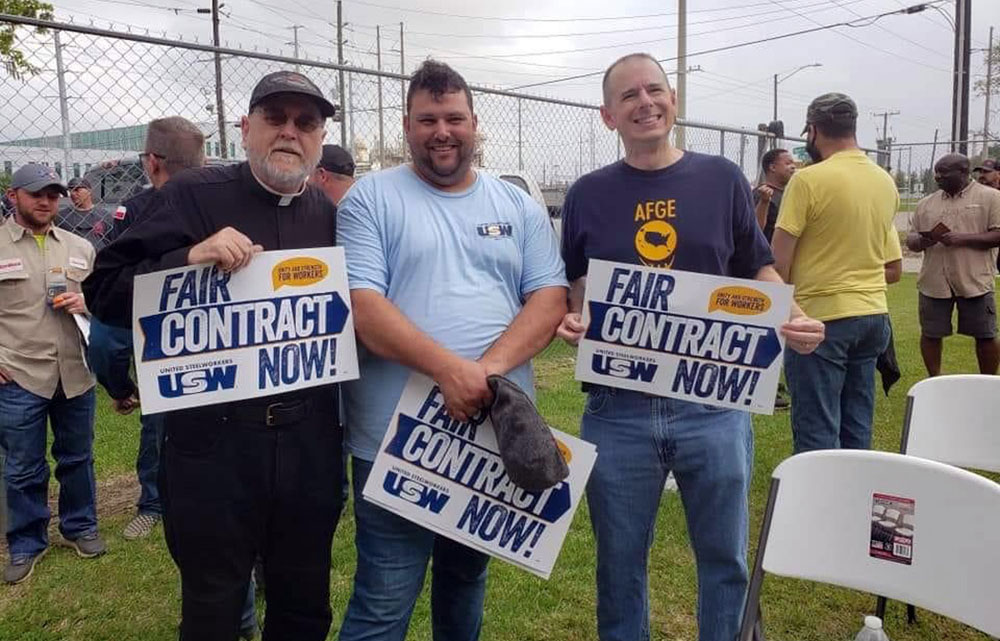 From left: Fr. Sinclair Oubre with labor leaders Jeremy Pavlich and Jeff Darby in Texas (RNS/Courtesy photo)