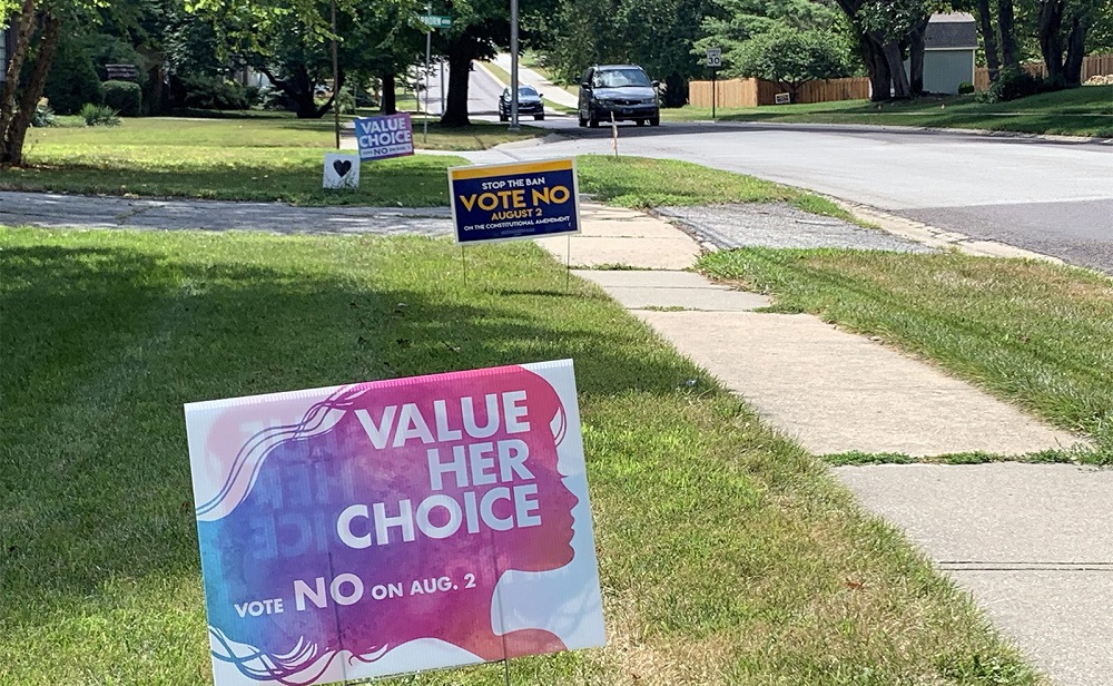 Signs opposing Amendment 2 line a street in Overland Park, Kansas, on July 27. (RNS/Kit Doyle)