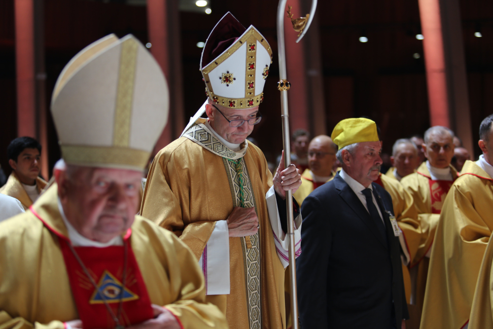 Archbishop Adrian Galbas of Warsaw, Poland, prays during Mass March 13, 2025, in Warsaw's Temple of Divine Providence. Archbishop Galbas in a July 25 statement said that he was "devastated and crushed" by the arrest of a diocesan priest in the brutal murder of a homeless man July 24 and the priest's confession to police he did it. (OSV News/courtesy Polish bishops' conference)