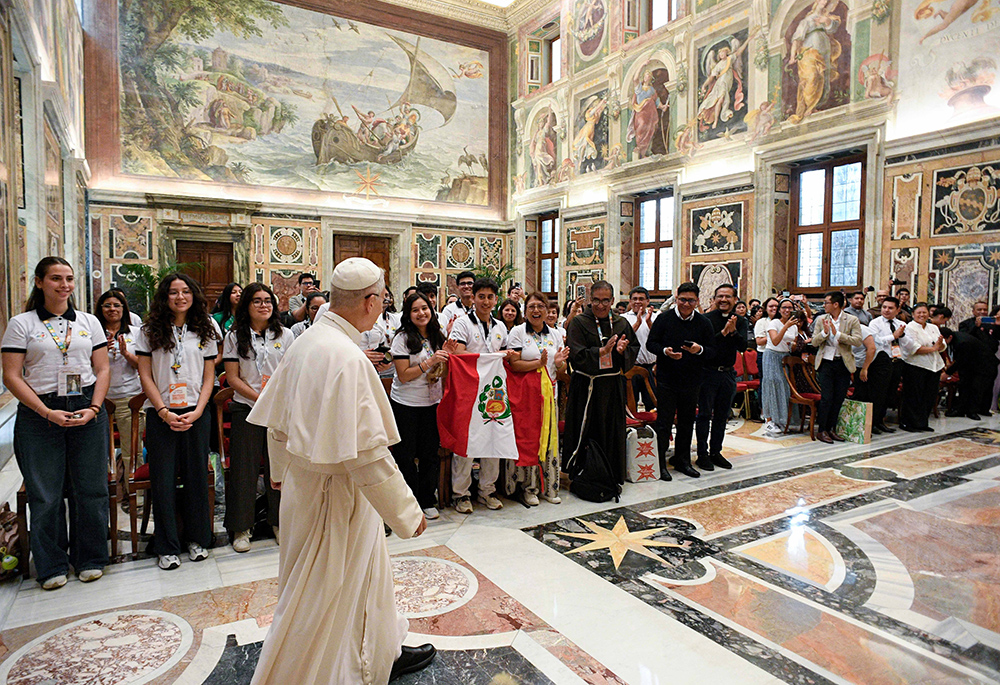 Pope Leo XIV meets with a group of young people from Peru at the Vatican July 28, 2025, as the Jubilee of Youth kicks off in Rome. (CNS/Vatican Media)