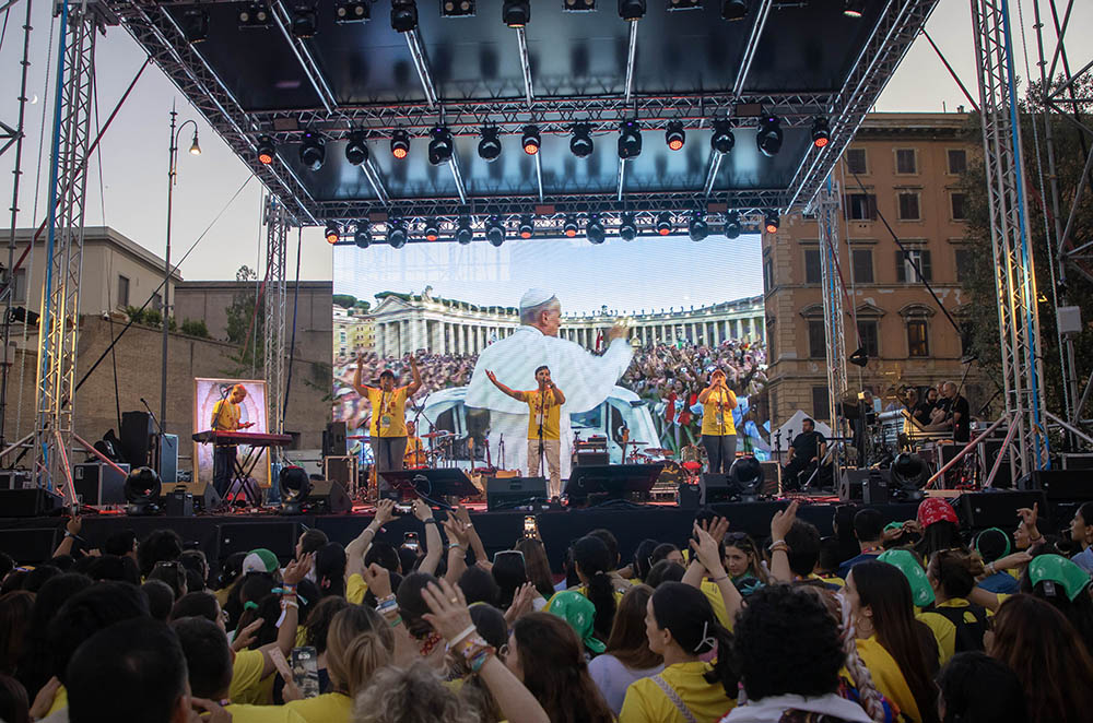 A band performs in front of an image of Pope Leo XIV displayed on a large screen during a festival in Risorgimento Square in Rome July 29, 2025, as part of the Jubilee of Digital Missionaries and Catholic Influencers. (CNS/Pablo Esparza)