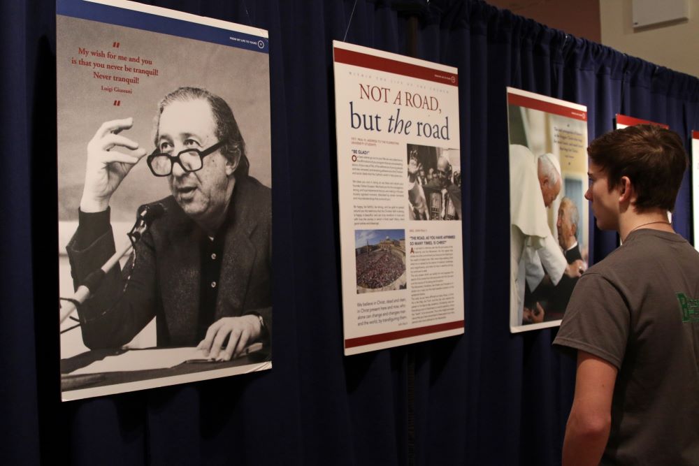 A man looks at an exhibit.