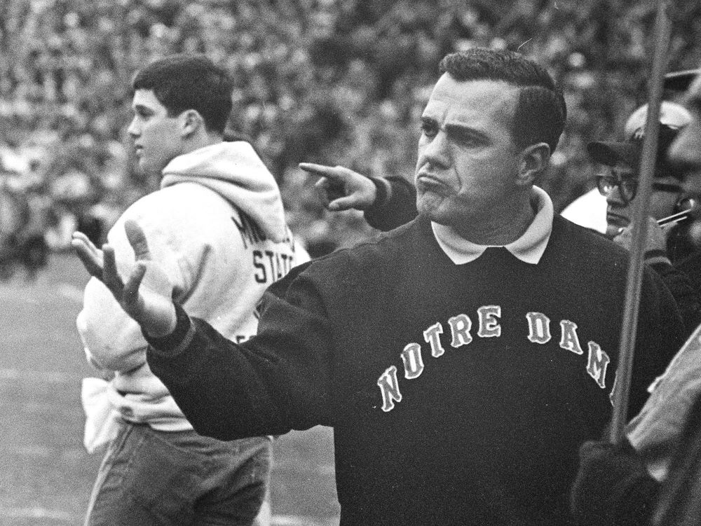 Notre Dame coach Ara Parseghian gestures during a college football game against Michigan State, in East Lansing, Mich. Nov. 19, 1966. 