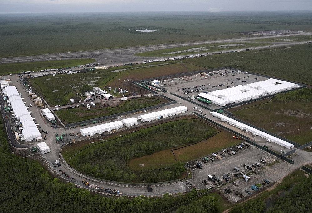 Work progresses on the migrant detention facility dubbed "Alligator Alcatraz," at Dade-Collier Training and Transition facility in the Florida Everglades, July 4, 2025, in Ochopee, Florida. (AP photo/Rebecca Blackwell)