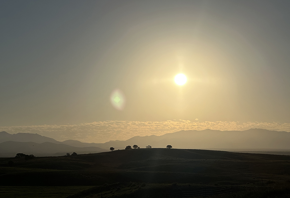 This Aug. 8, 2025, image taken on shows the sun over San Rafael Ranch near the international border in southern Arizona, home to a vast biodiversity of fauna that will be cut off from Mexico by a border wall that the Trump administration intends to start building later this month (August 2025). (Ross Humphreys) 