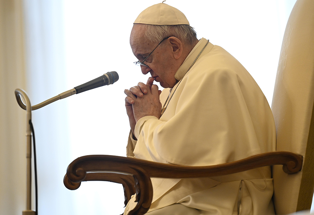 Pope Francis leads his general audience in the library of the Apostolic Palace at the Vatican Jan. 27, 2021. Francis continued his series of talks on prayer, reflecting on the theme "Praying with Sacred Scripture." (CNS/Vatican Media)