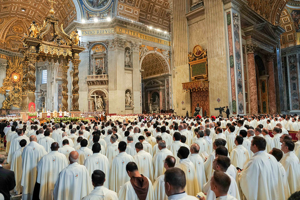 Priests join in prayer during Mass with Pope Leo XIV on the feast of the Sacred Heart of Jesus in St. Peter’s Basilica at the Vatican June 27, 2025. (CNS/Lola Gomez)