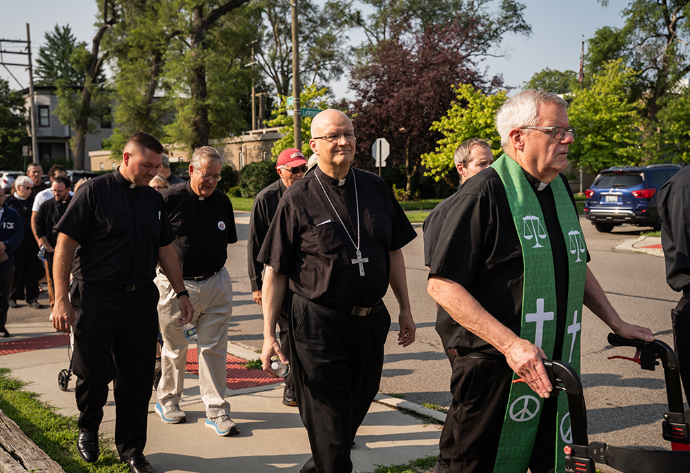Detroit Archbishop Edward Weisenburger joins other clergy during a procession from Most Holy Trinity Church in Detroit's Corktown neighborhood to the ICE Regional Field Office on Michigan Avenue in downtown Detroit July 14, 2025. The procession was organized by Strangers No Longer, a Catholic grassroots immigrant rights advocacy group. (OSV News/Detroit Catholic/Valaurian Waller)