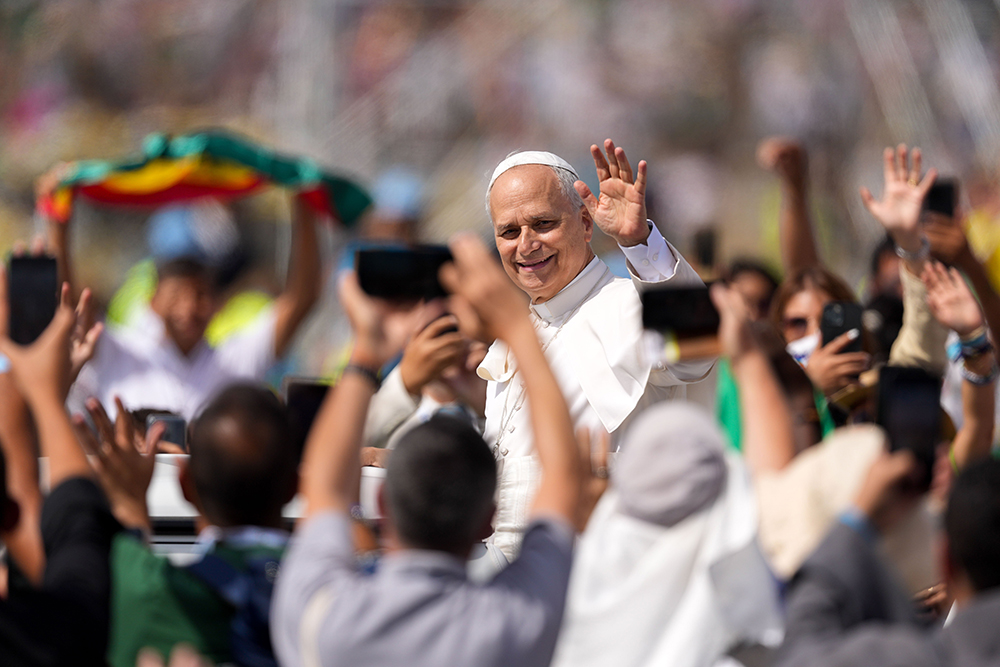 Pope Leo XIV waves to the crowd from the popemobile as he departs after celebrating a Mass concluding the Jubilee of Youth in Rome’s Tor Vergata neighborhood Aug. 3, 2025. (CNS/Lola Gomez)