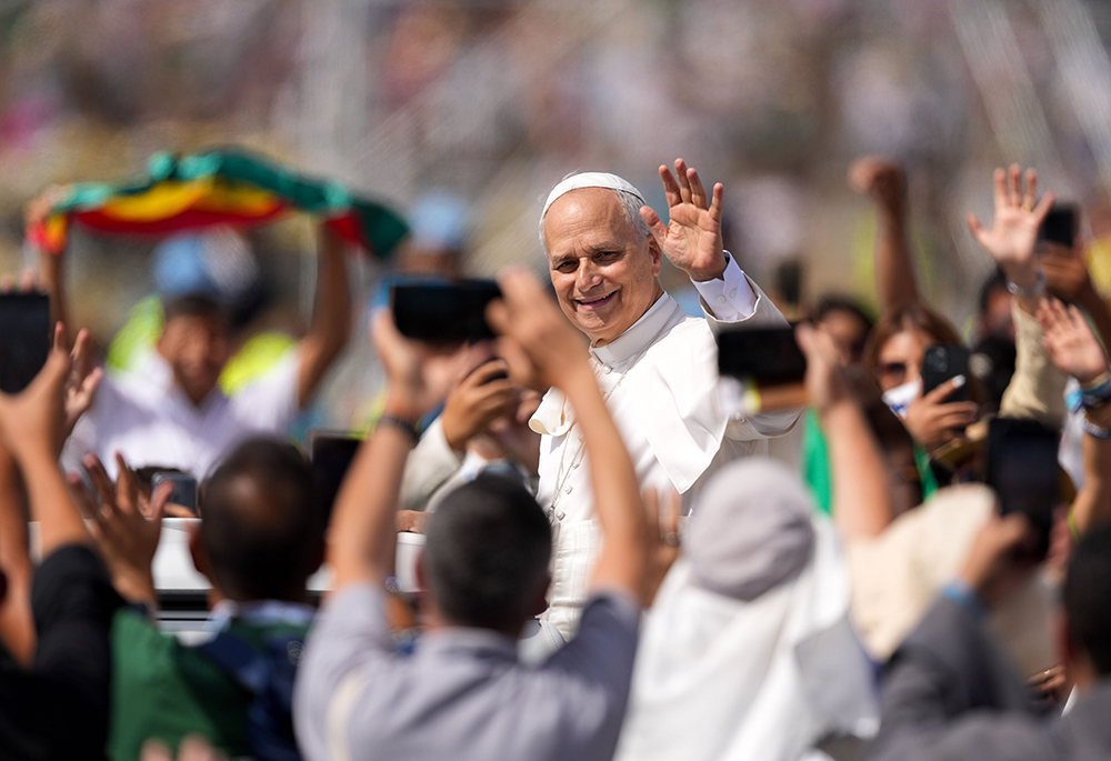 Pope Leo XIV waves to the crowd from the popemobile as he departs after celebrating a Mass concluding the Jubilee of Youth in Rome’s Tor Vergata neighborhood Aug. 3, 2025. (CNS/Lola Gomez)