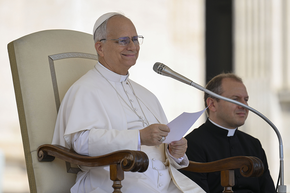 Pope Leo XIV smiles as he greets pilgrims and visitors at his general audience Aug. 6, 2025, in St. Peter's Square at the Vatican. (CNS/Vatican Media)