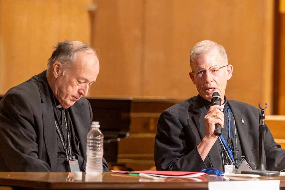 Archbishop John Wester of Santa Fe, N.M., speaks during a peace gathering in Hiroshima, Japan, Aug. 5, 2025, the eve of the 80th anniversary of the United States dropping the atomic bomb on Hiroshima. At left is Cardinal Robert McElroy of Washington. (OSV News/Catholic Standard/Mihoko Owada)