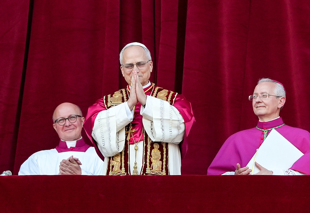 Pope Leo XIV, the former Cardinal Robert F. Prevost, waves to the crowds in St. Peter's Square at the Vatican after his election as pope May 8, 2025. The new pope was born in Chicago. (CNS/Lola Gomez)