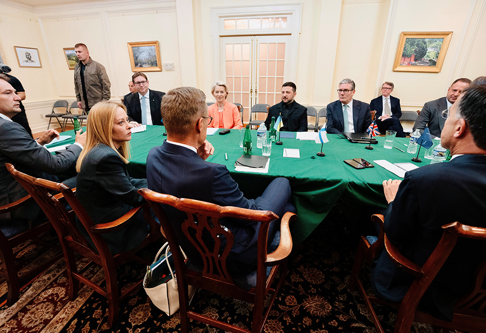 Ukrainian President Volodymyr Zelenskyy, center, meets some of the European leaders at the Ukrainian Embassy ahead of their meeting with U.S. President Donald Trump in Washington Aug. 18, 2025. (OSV News/Reuters/Italian Prime Ministry handout)