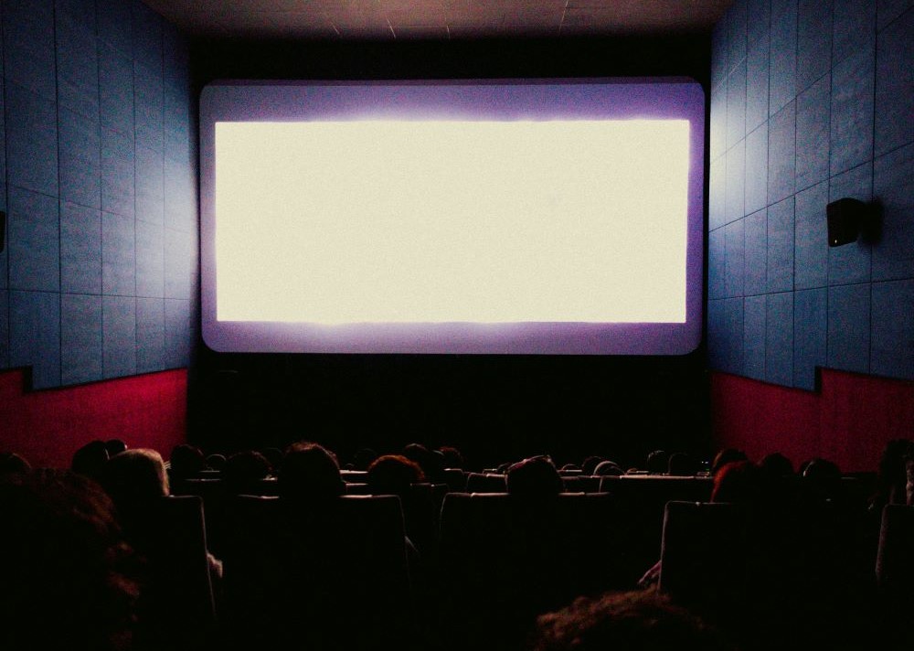 blank movie screen in empty theater