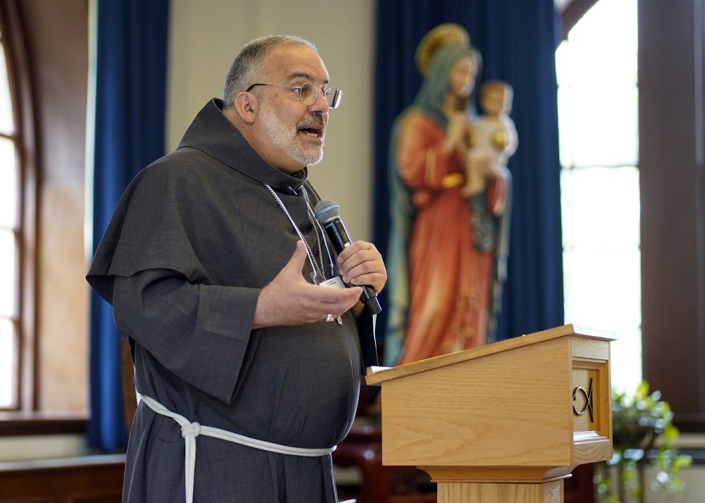 Bishop John Stowe speaks at Mass.